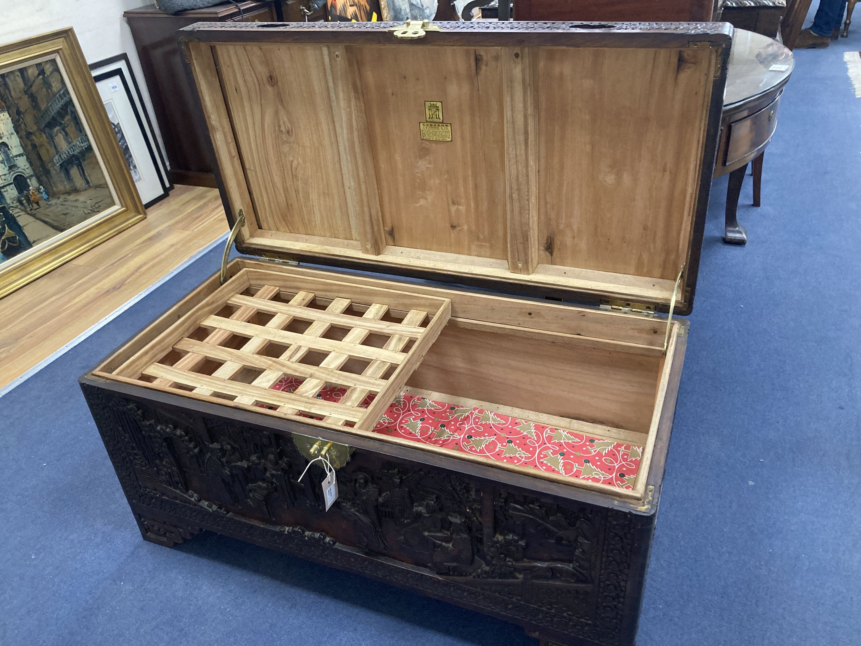 A carved camphorwood blanket box, length 101cm, depth 50cm, height 50cm